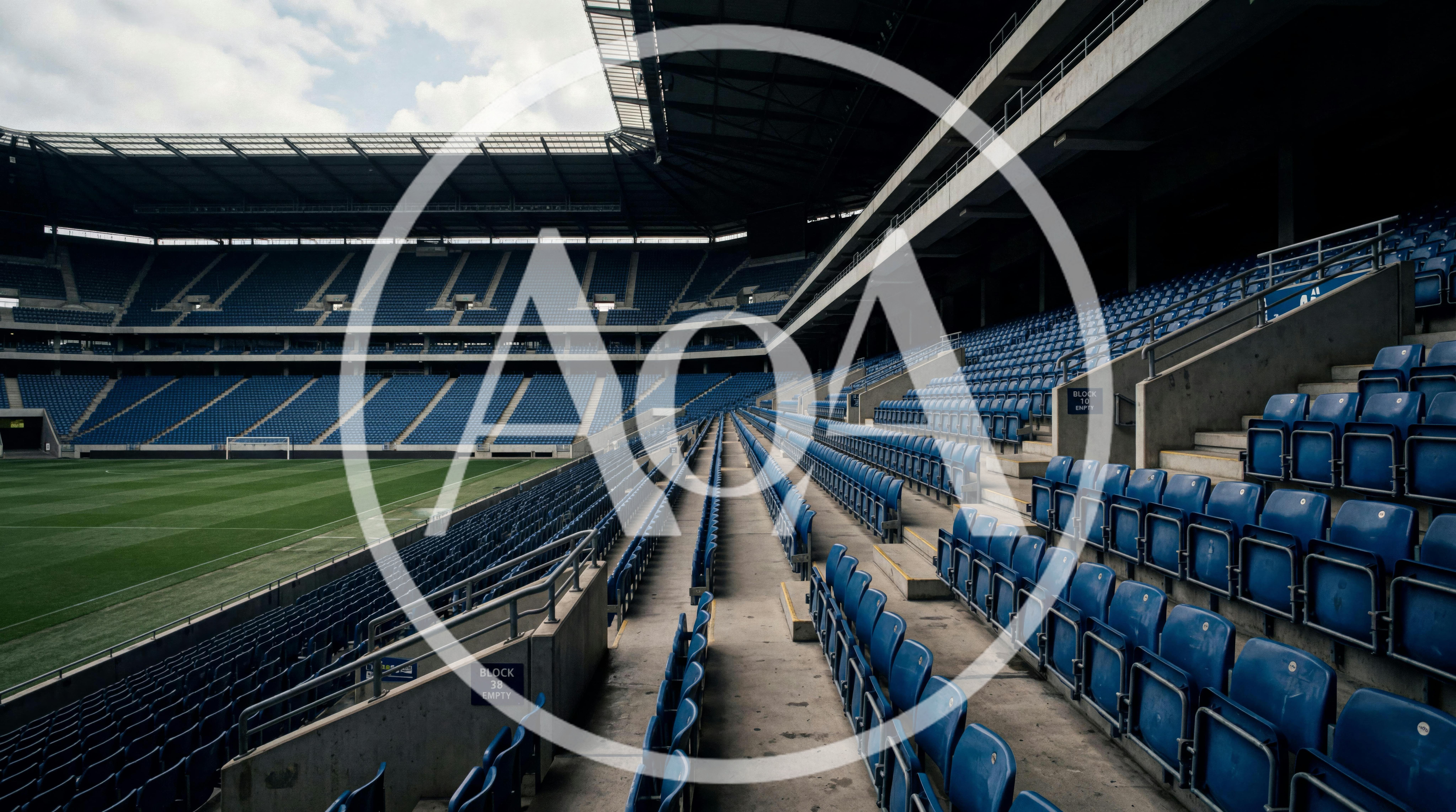 Empty Blue Stadium Seats At A Professional Football Arena