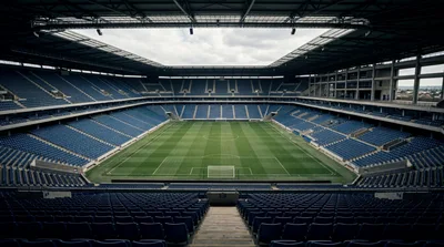 Empty Modern Football Stadium With Blue Seats