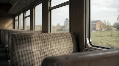 Empty Train Carriage With Vintage Patterned Seats