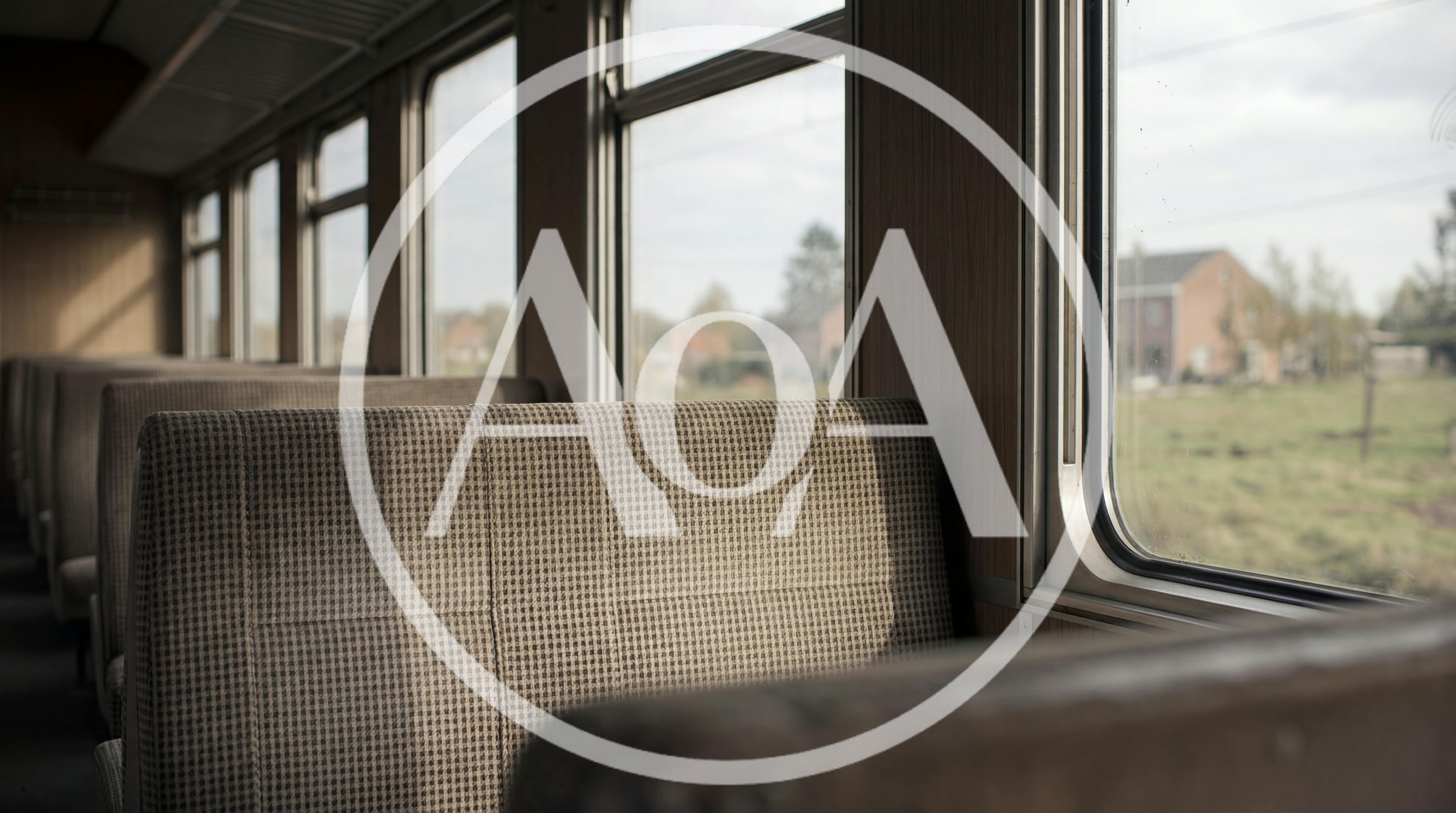 Empty Train Carriage With Vintage Patterned Seats