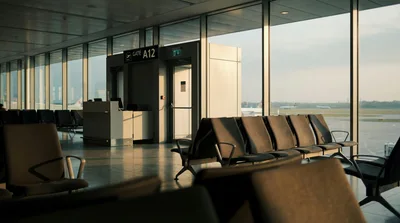 Empty Airport Departure Gate A12 At Sunset