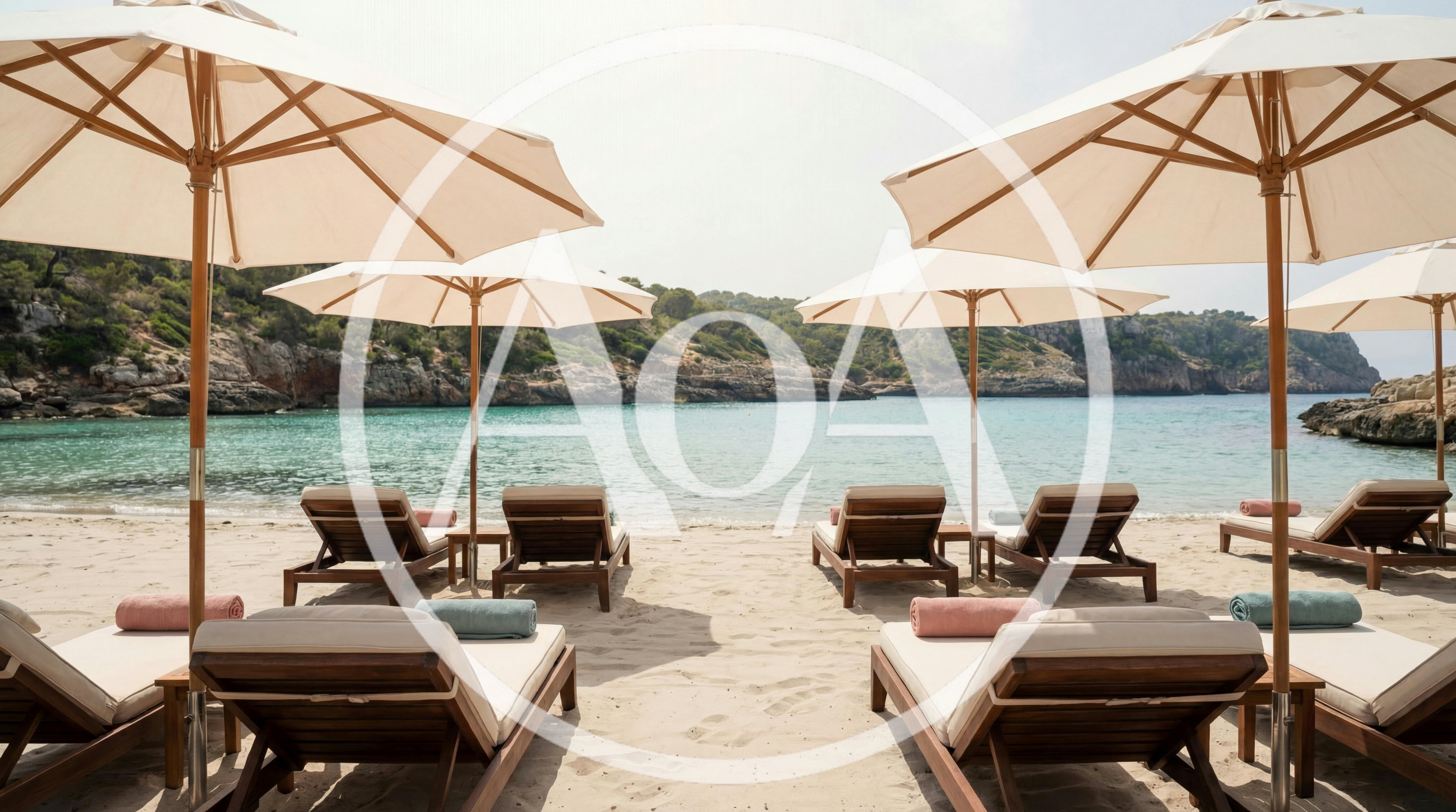 Luxury Beach Lounge Chairs With Umbrellas On Tropical Shore