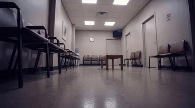 Empty Waiting Room With Rows Of Chairs