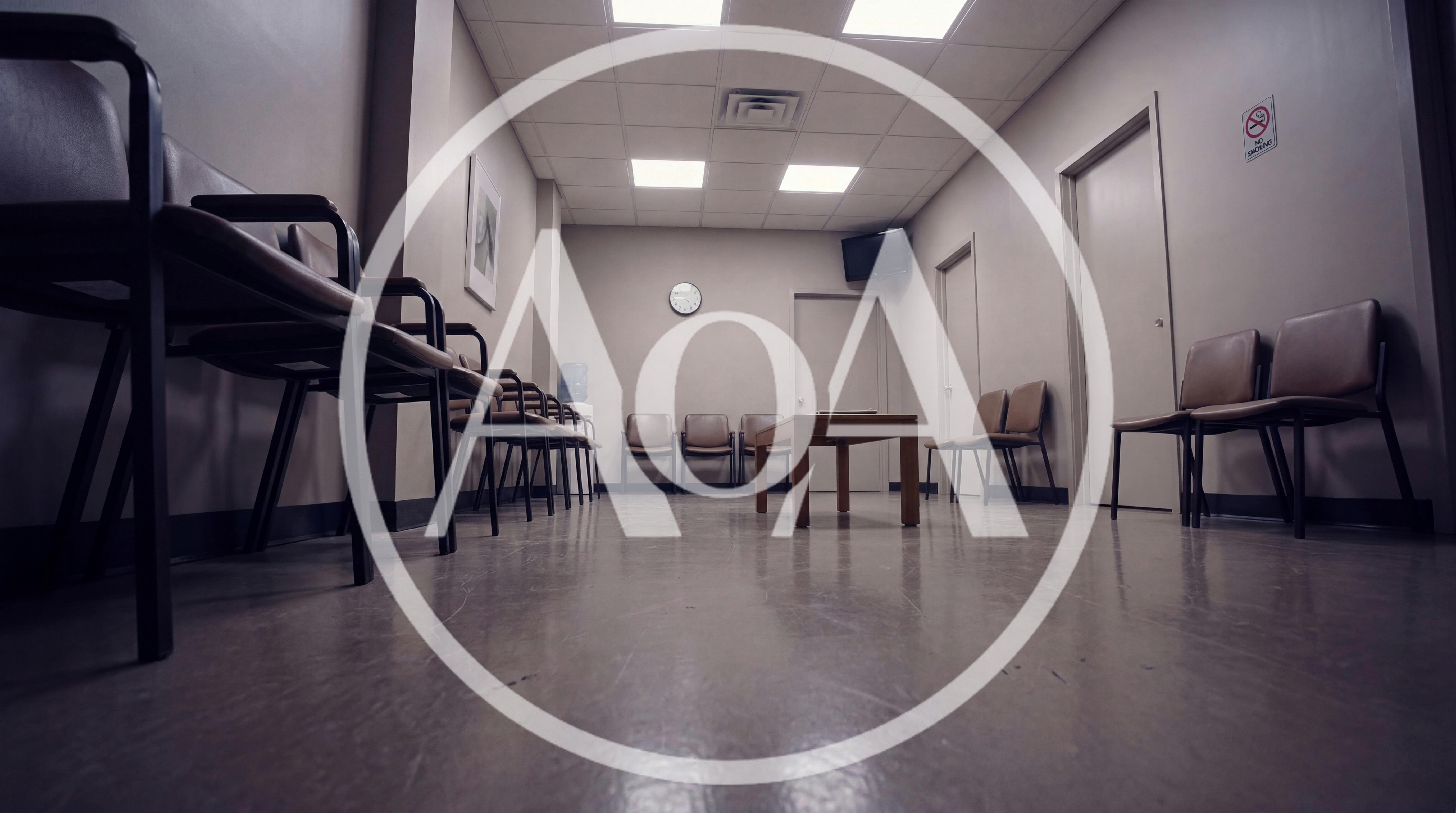 Empty Waiting Room With Rows Of Chairs