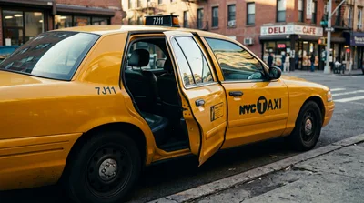 Yellow New York City Taxi Cab With Open Door