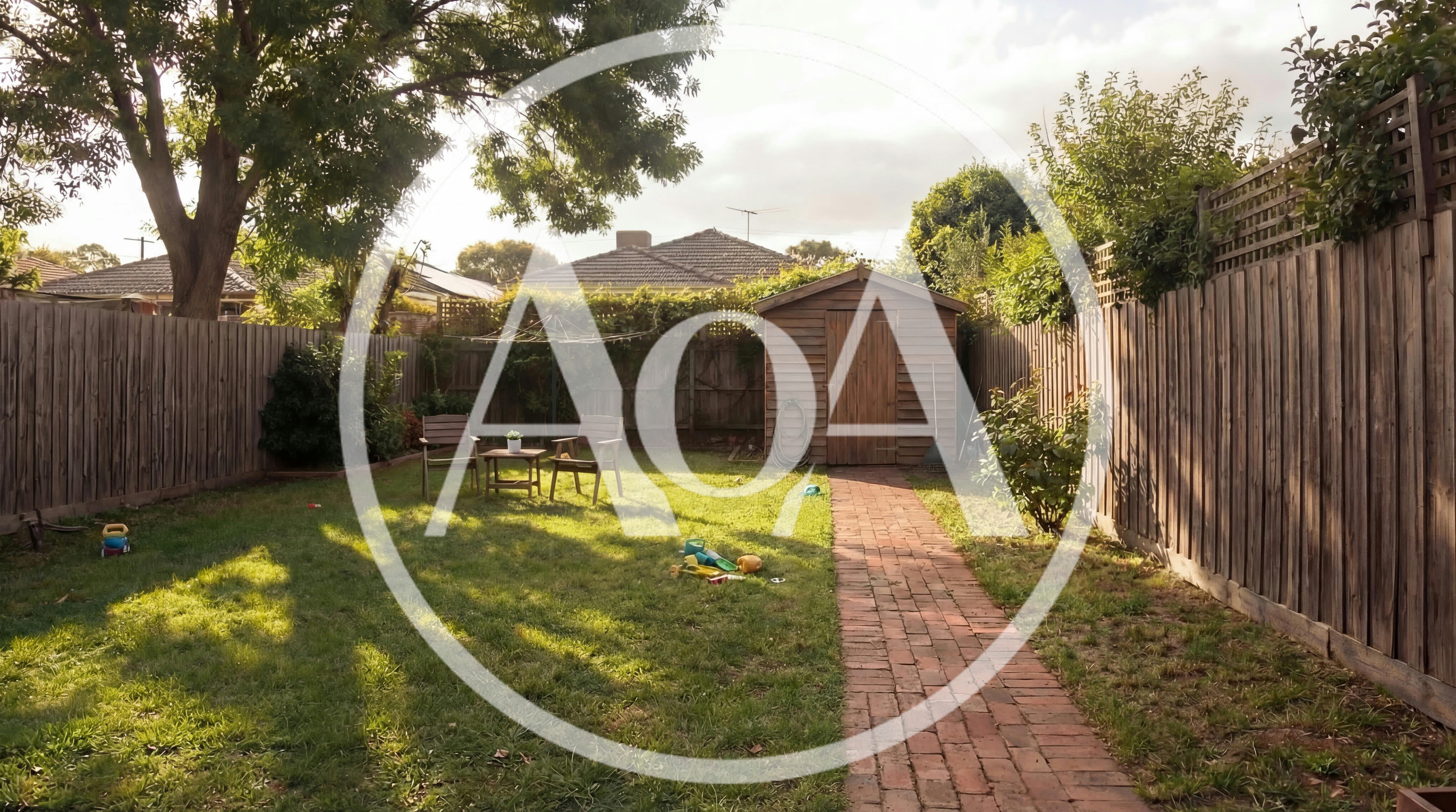 Backyard Garden With Wooden Shed And Brick Path