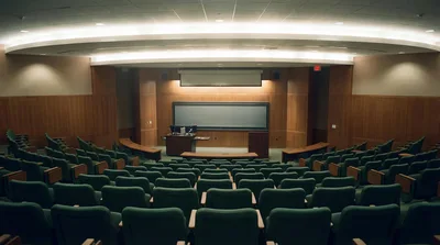 Empty University Lecture Hall With Wooden Walls