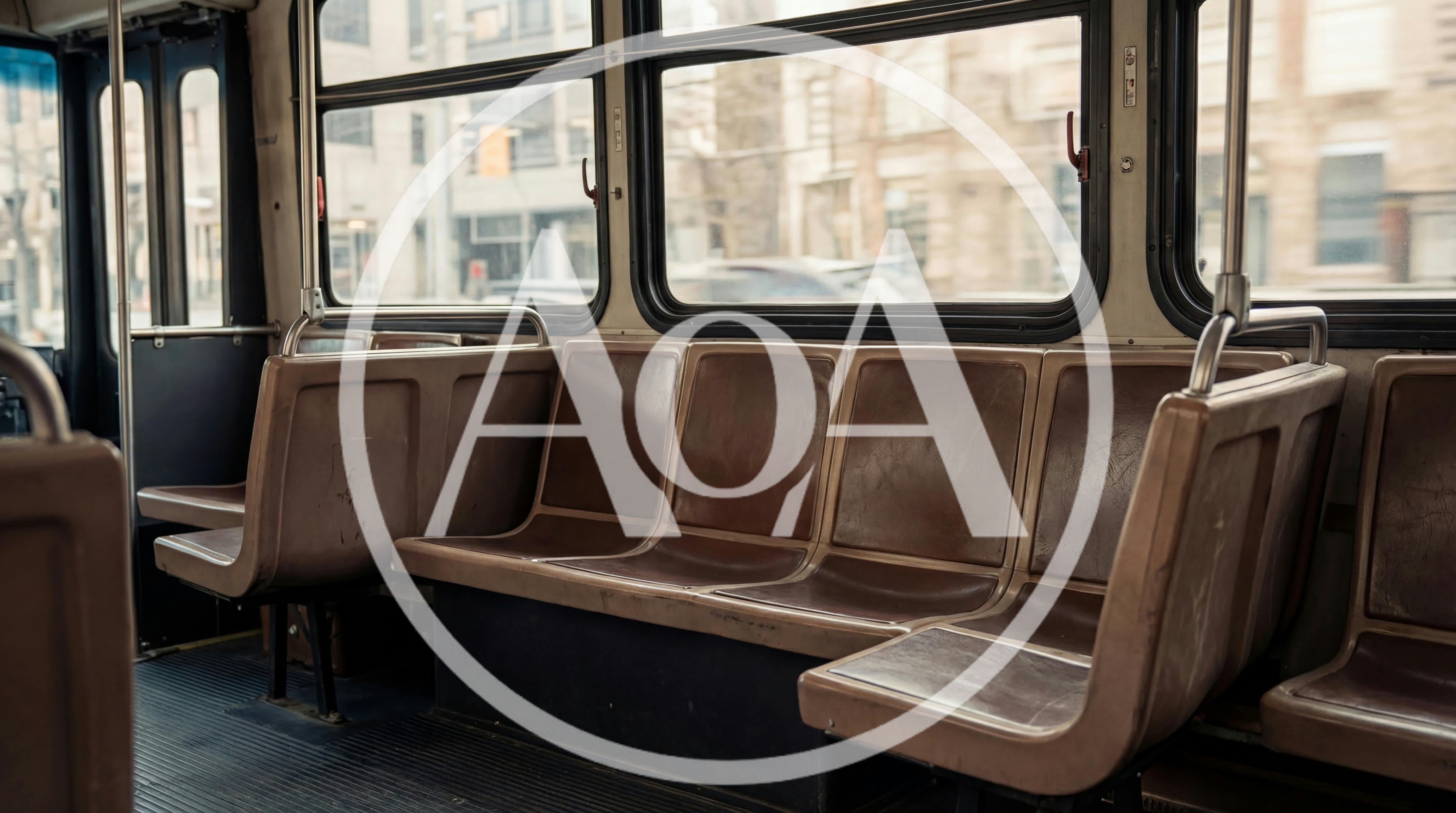 Empty Brown Seats Inside A Public Transit Bus