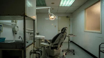 Empty Dental Examination Room With Vintage Equipment