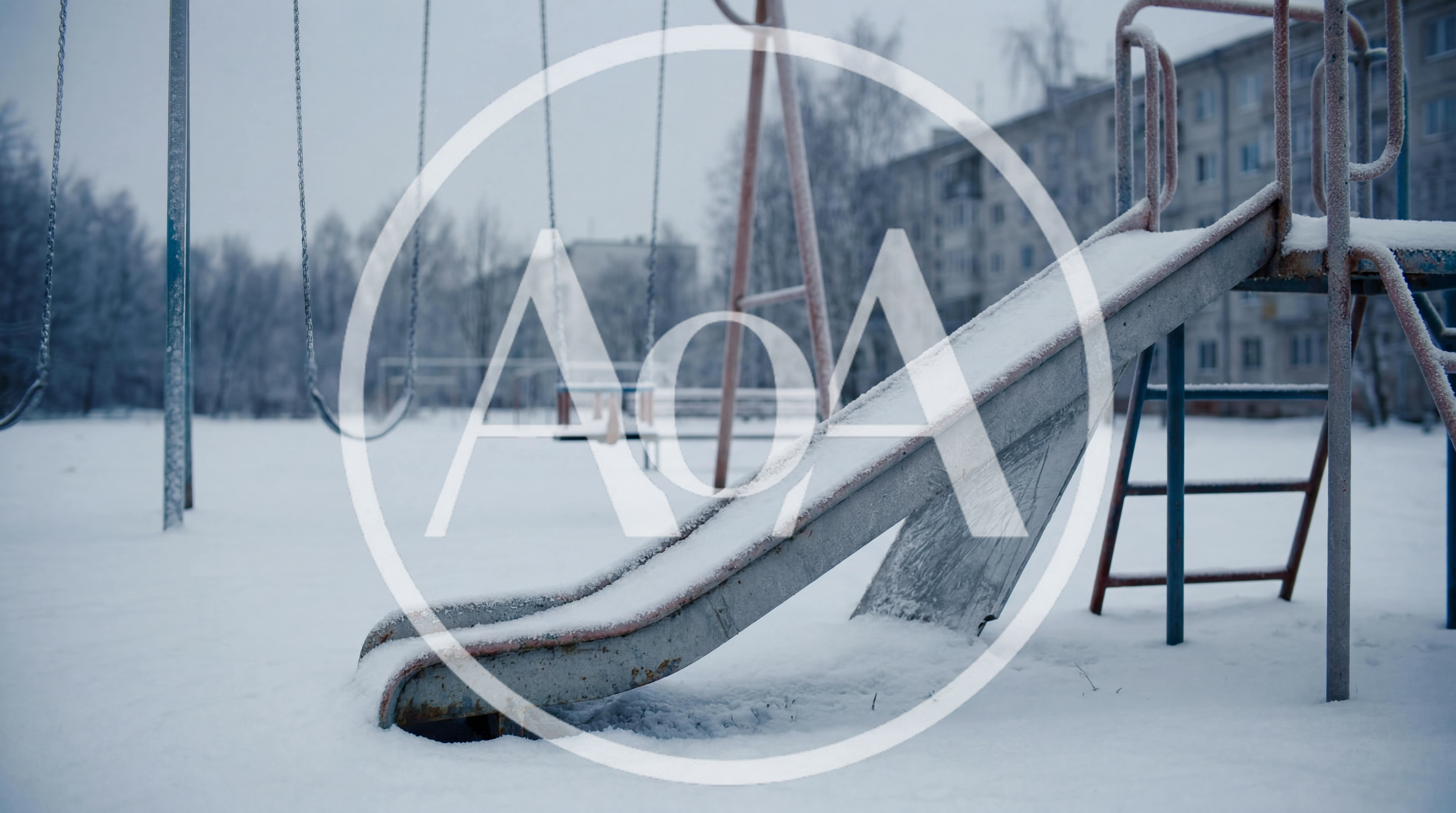 Empty Playground Slide and Swings in Snowy Winter