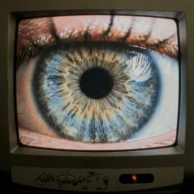 Human Eye Blinking On Vintage Television Screen