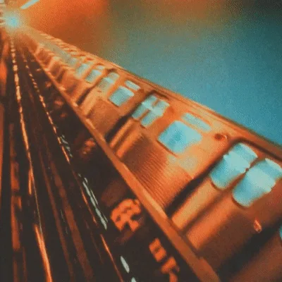 Subway Train Moving Through A Dark Tunnel