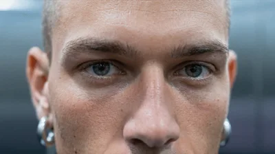 Close Up Portrait Of A Young Man In Elevator