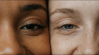 Close Up Of Two Women With Different Skin Tones