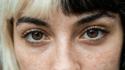Close Up Of A Young Woman With Heterochromatic Hair