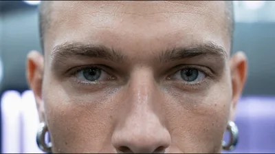 Close Up Portrait Of A Young Man In Elevator