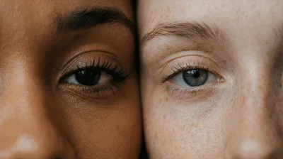 Close Up Of Two Women With Different Skin Tones
