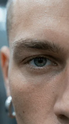 Close Up Of A Man Blinking His Green Eye
