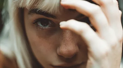 Close Up Portrait Of Young Woman With Split Hair