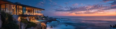 Modern Luxury Cliffside Villa Overlooking The Ocean At Sunset