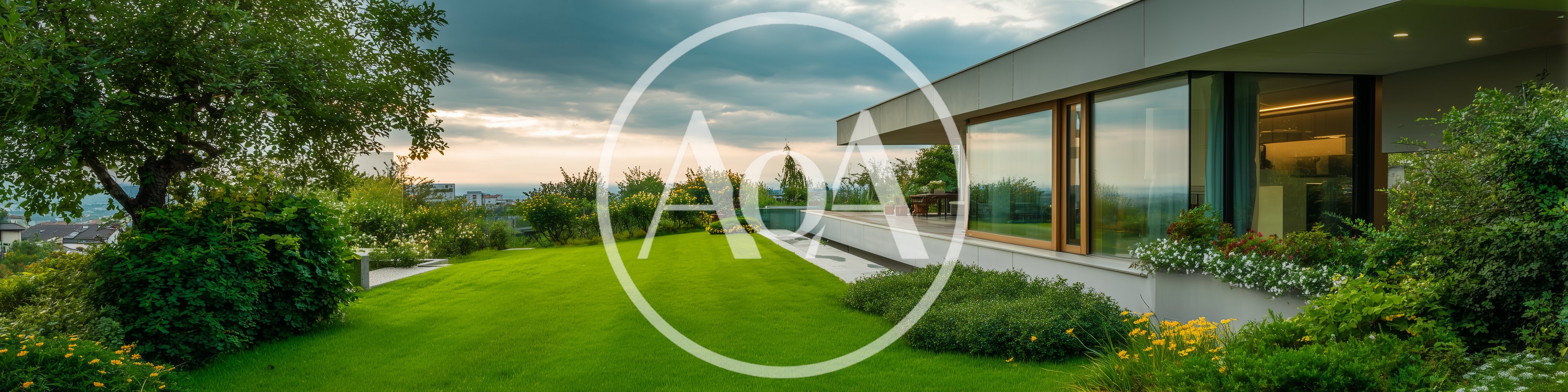 Modern Luxury House With Expansive Green Lawn At Sunset