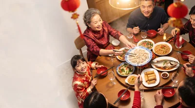Multi-Generational Family Celebrating Chinese New Year Dinner