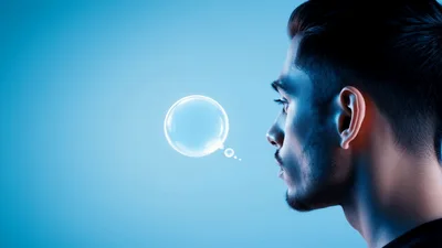 Young Man Imagining A Brain Made Of Bubbles