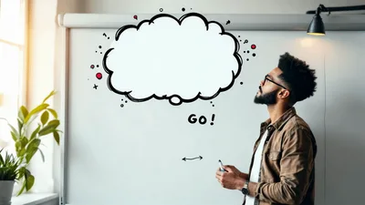 Man Standing Before Whiteboard With Animated Thought Bubble