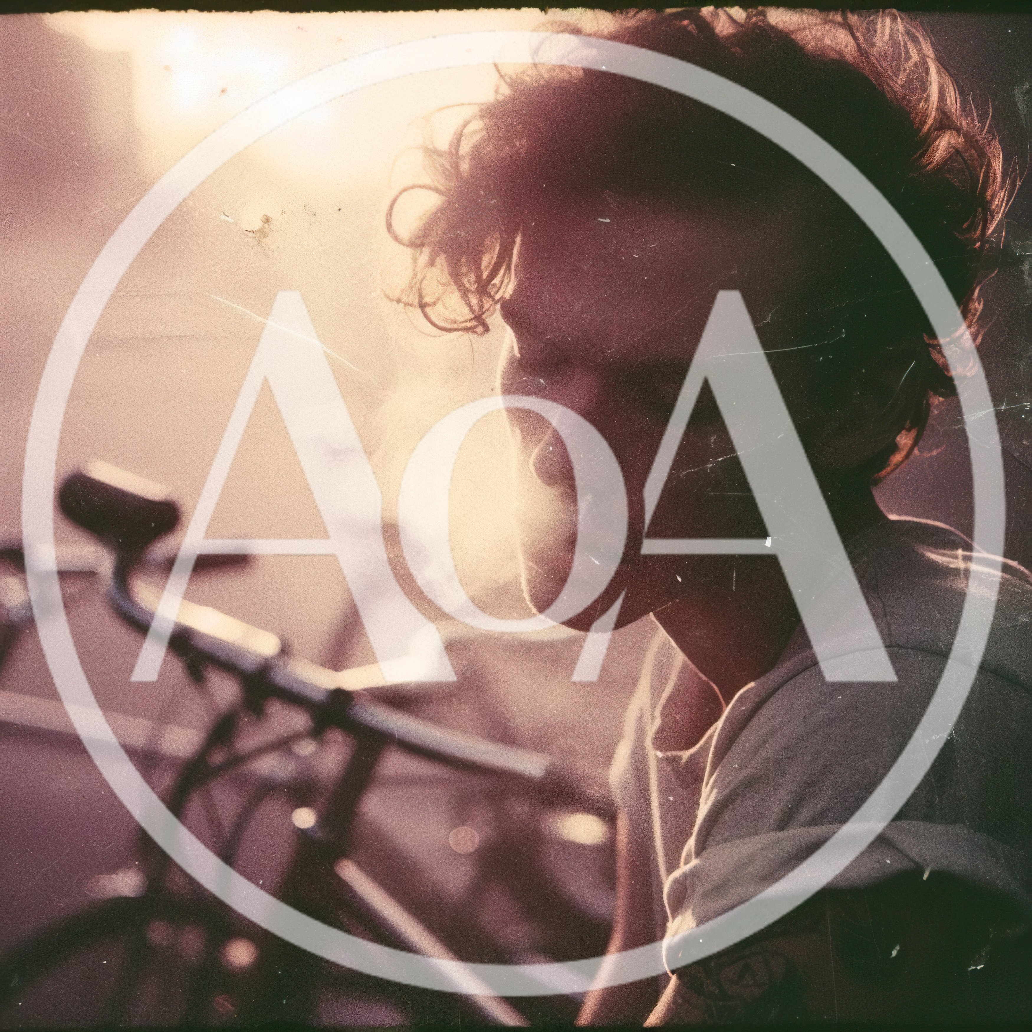 Young Man With Bicycle In Golden Hour Sunlight
