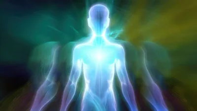 Glowing Ethereal Human Silhouette With Radiant Energy Aura
