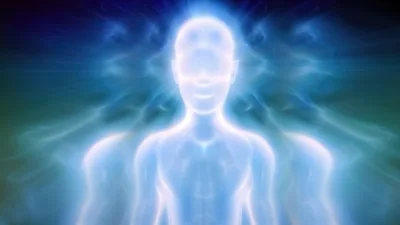 Glowing Ethereal Human Silhouette In Radiant Blue Light