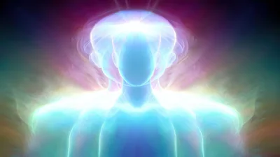 Ethereal Human Silhouette With Radiant Light Aura