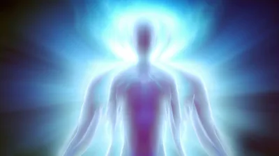 Ethereal Human Silhouette Radiating Bright Blue Light