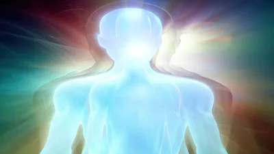 Glowing Ethereal Human Silhouette With Radiant Light Aura