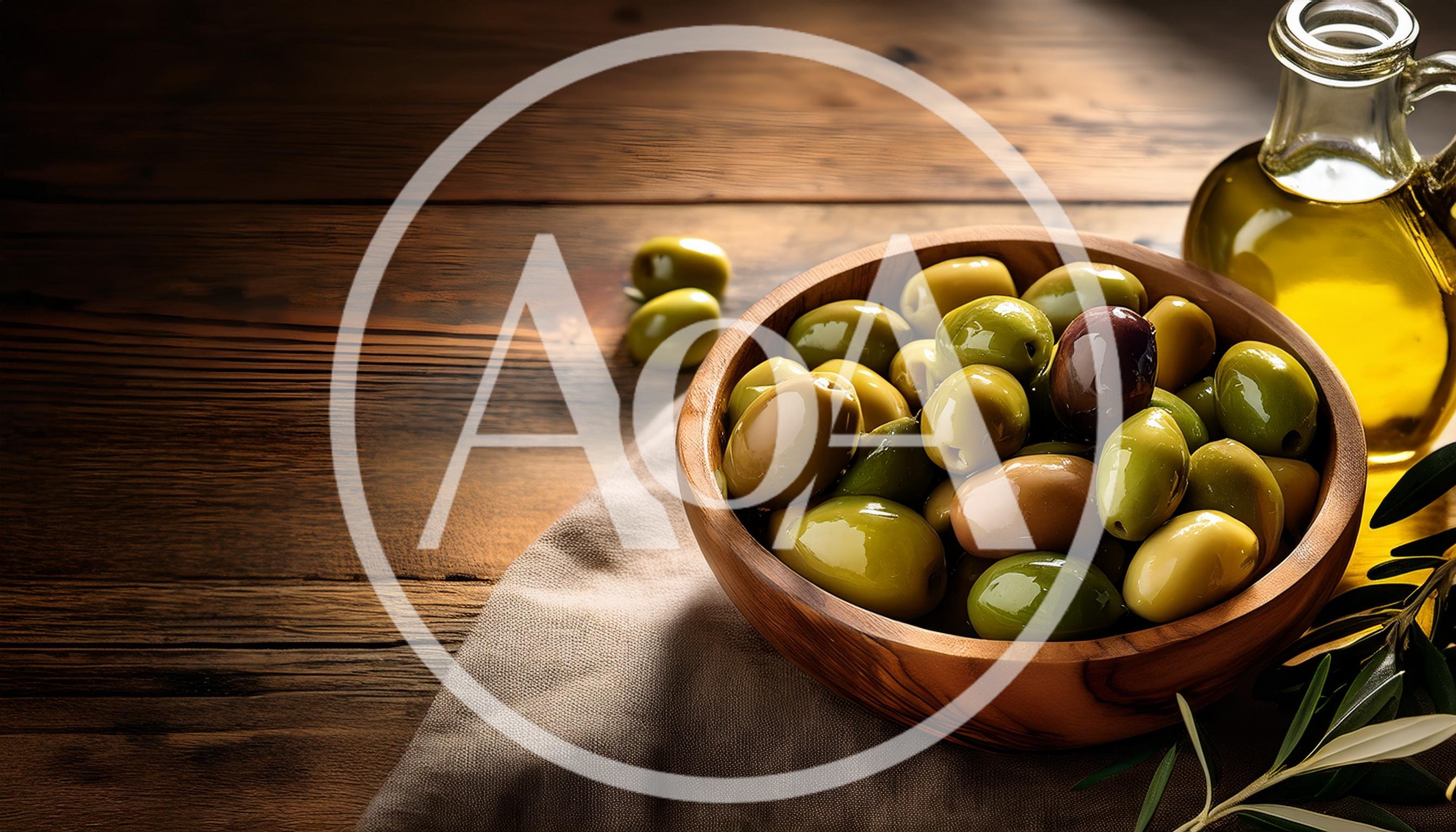 Bowl Of Fresh Green And Black Olives With Olive Oil