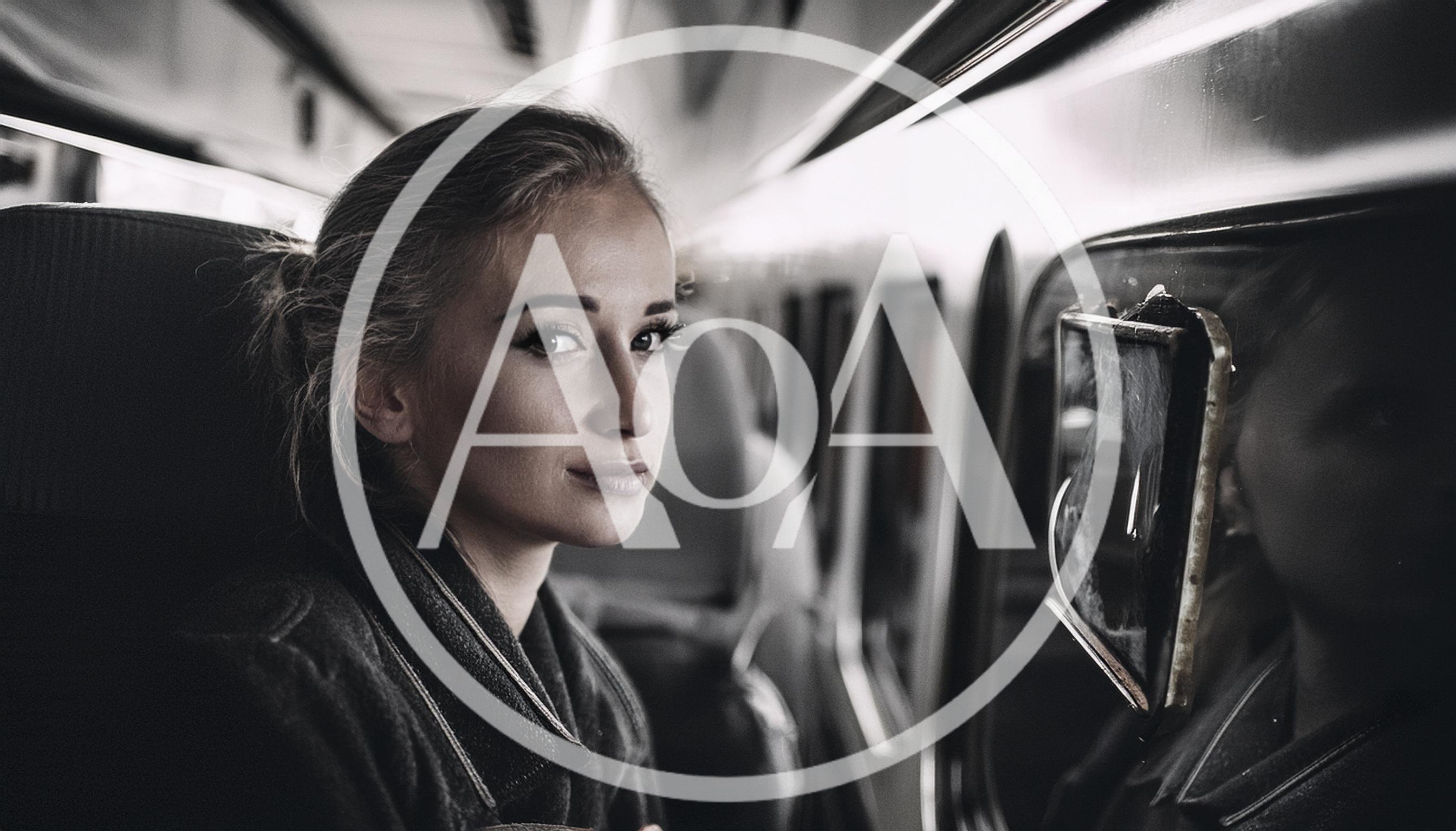 Young Woman Looking Out Train Window During Travel