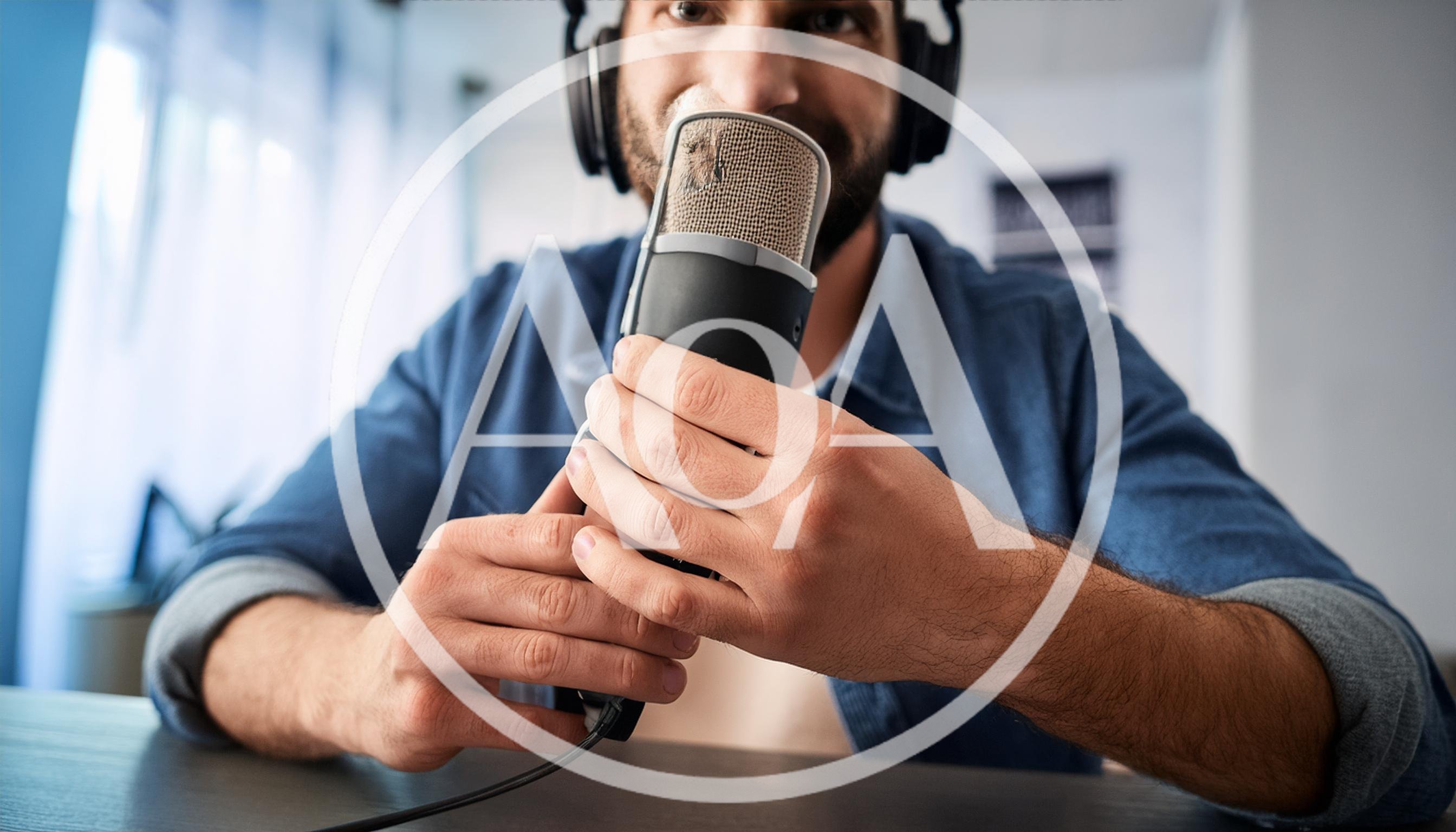 Podcaster Speaking Into A Professional Studio Microphone