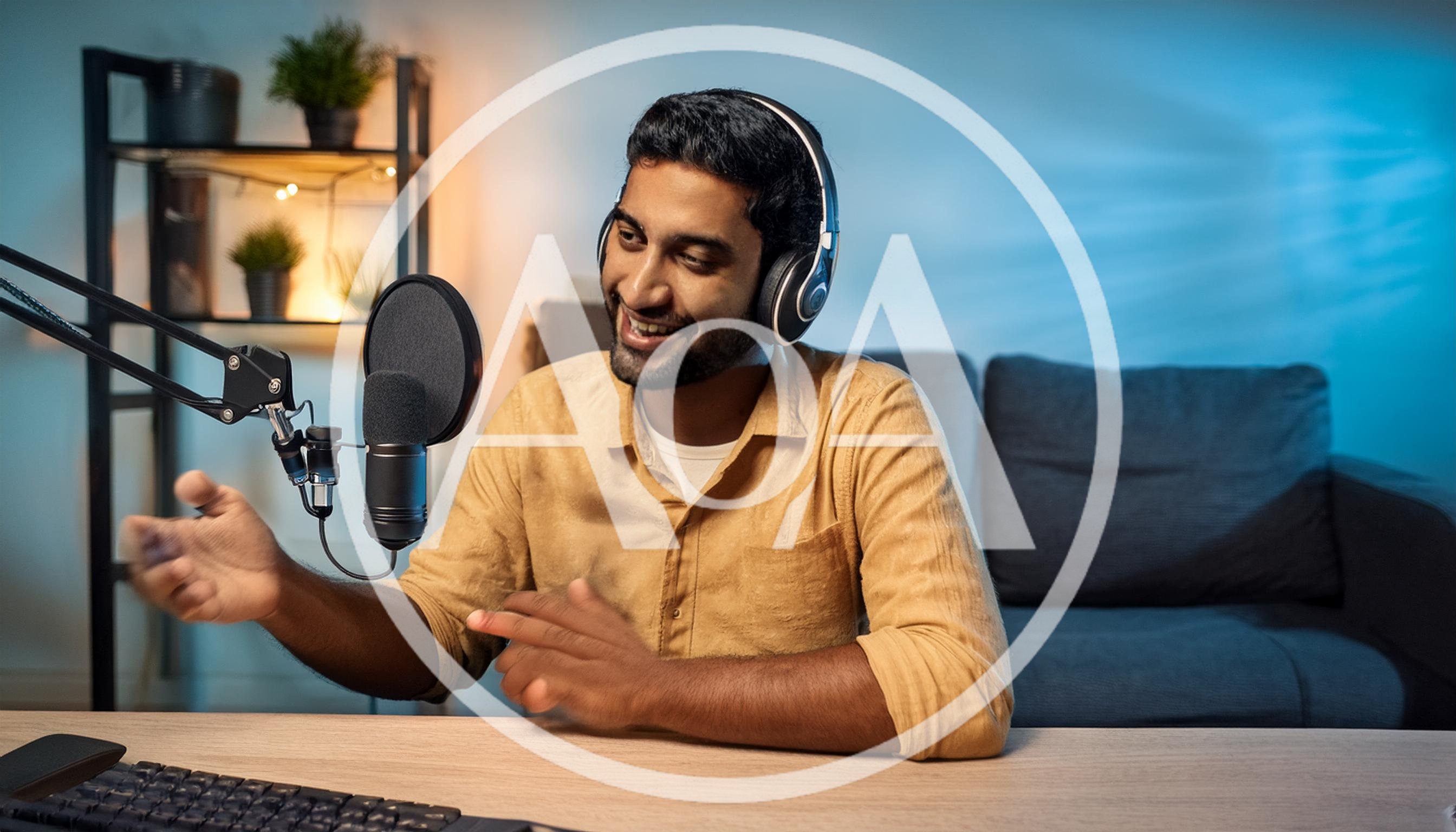 Young Man Recording Podcast In Home Studio