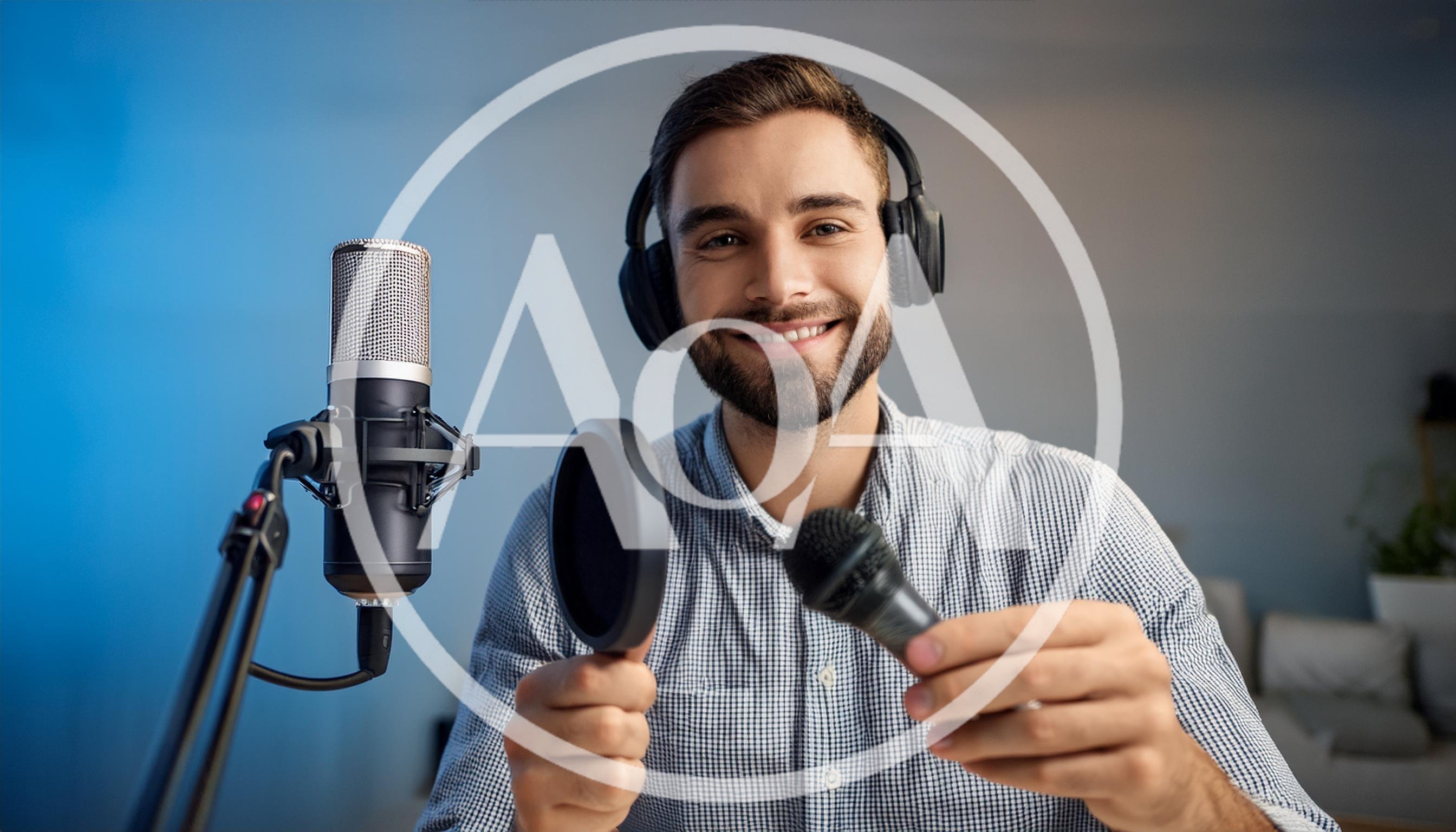 Podcaster Holding Microphone And Pop Filter In Studio