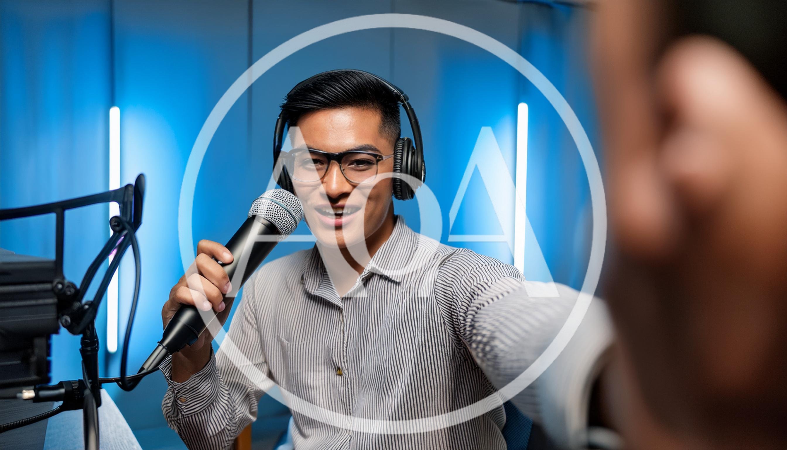 Young Man Recording Podcast In Studio