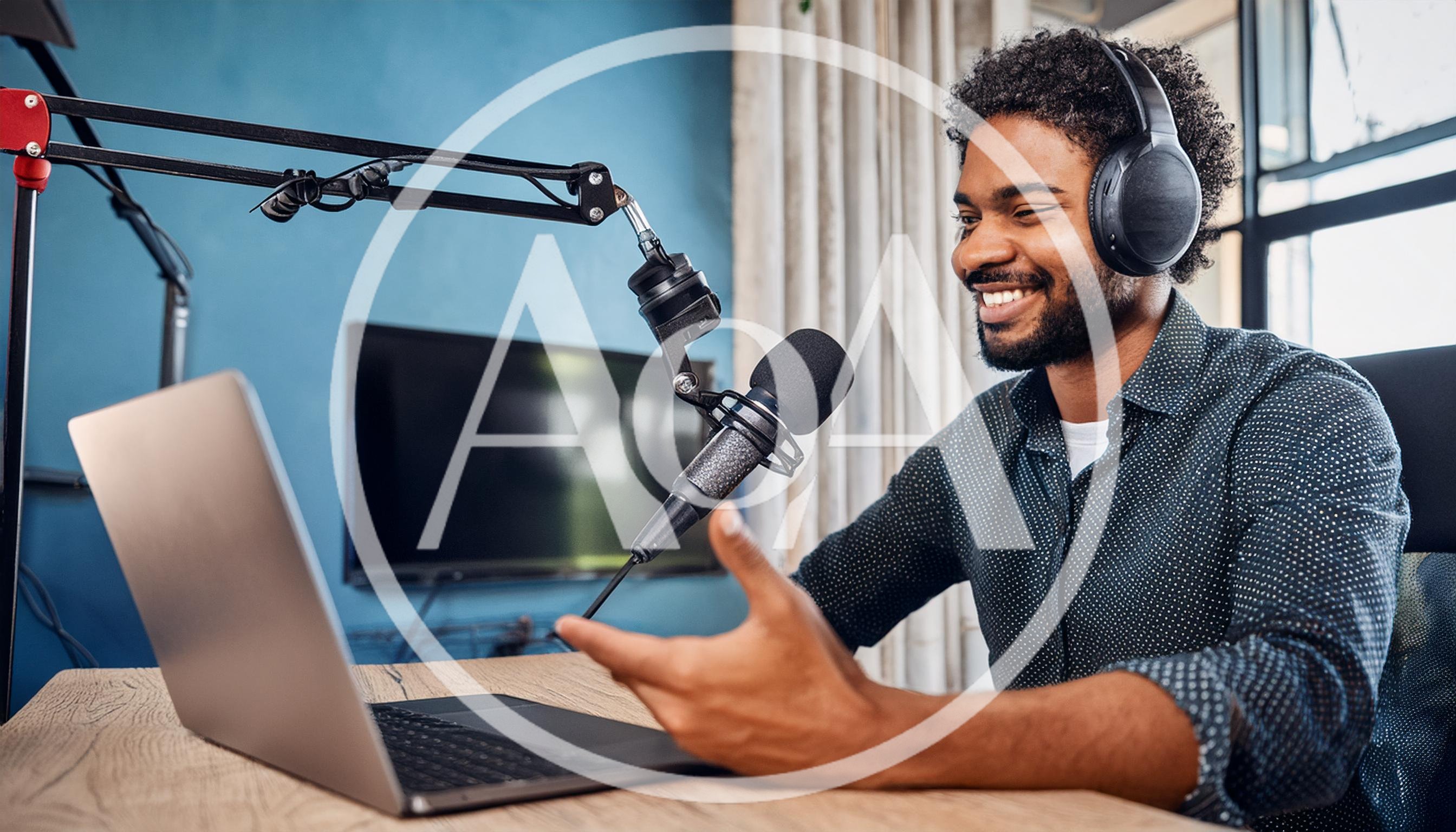 Young Man Recording A Podcast In Home Studio