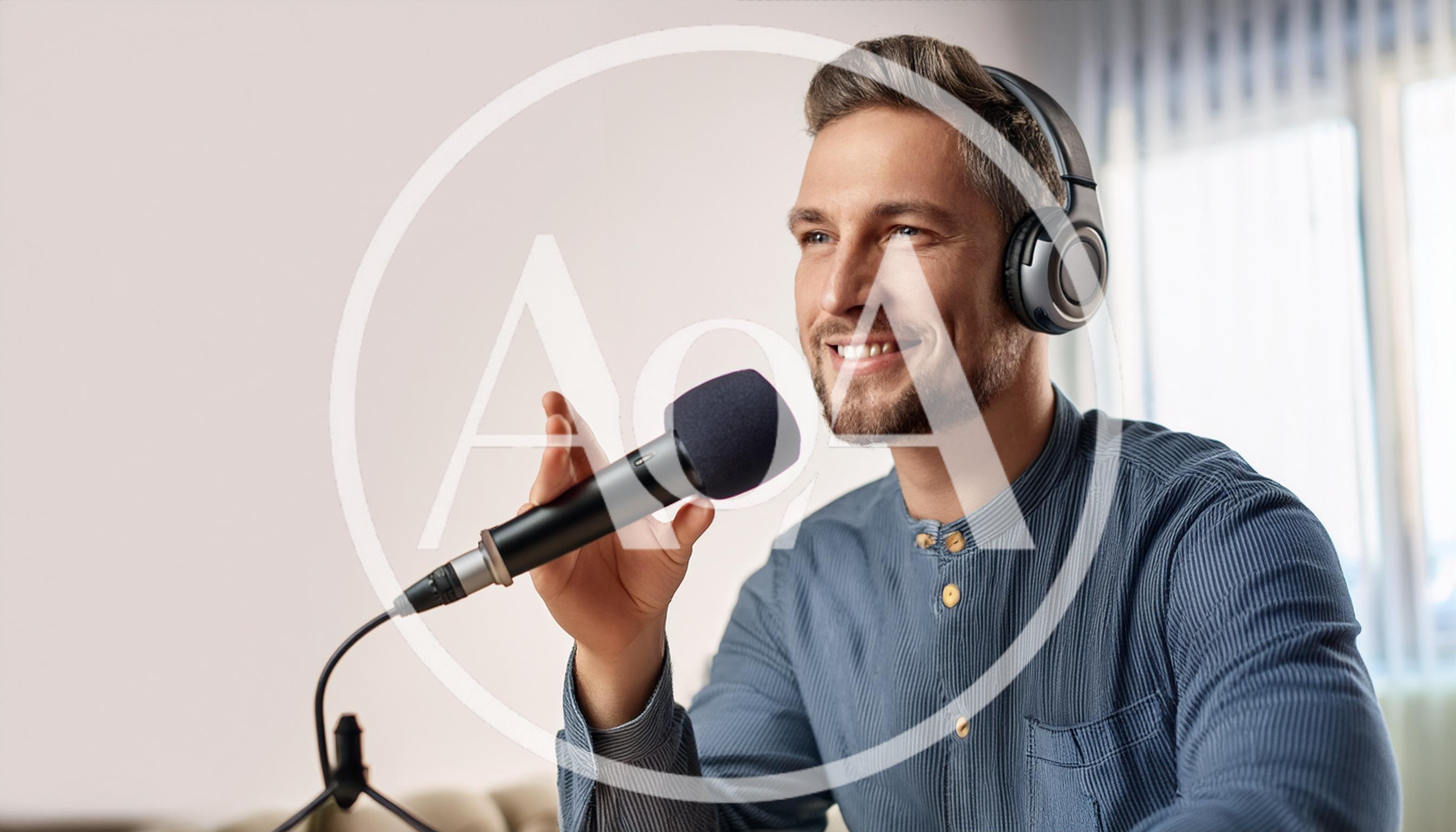 Man Recording Podcast With Microphone And Headphones