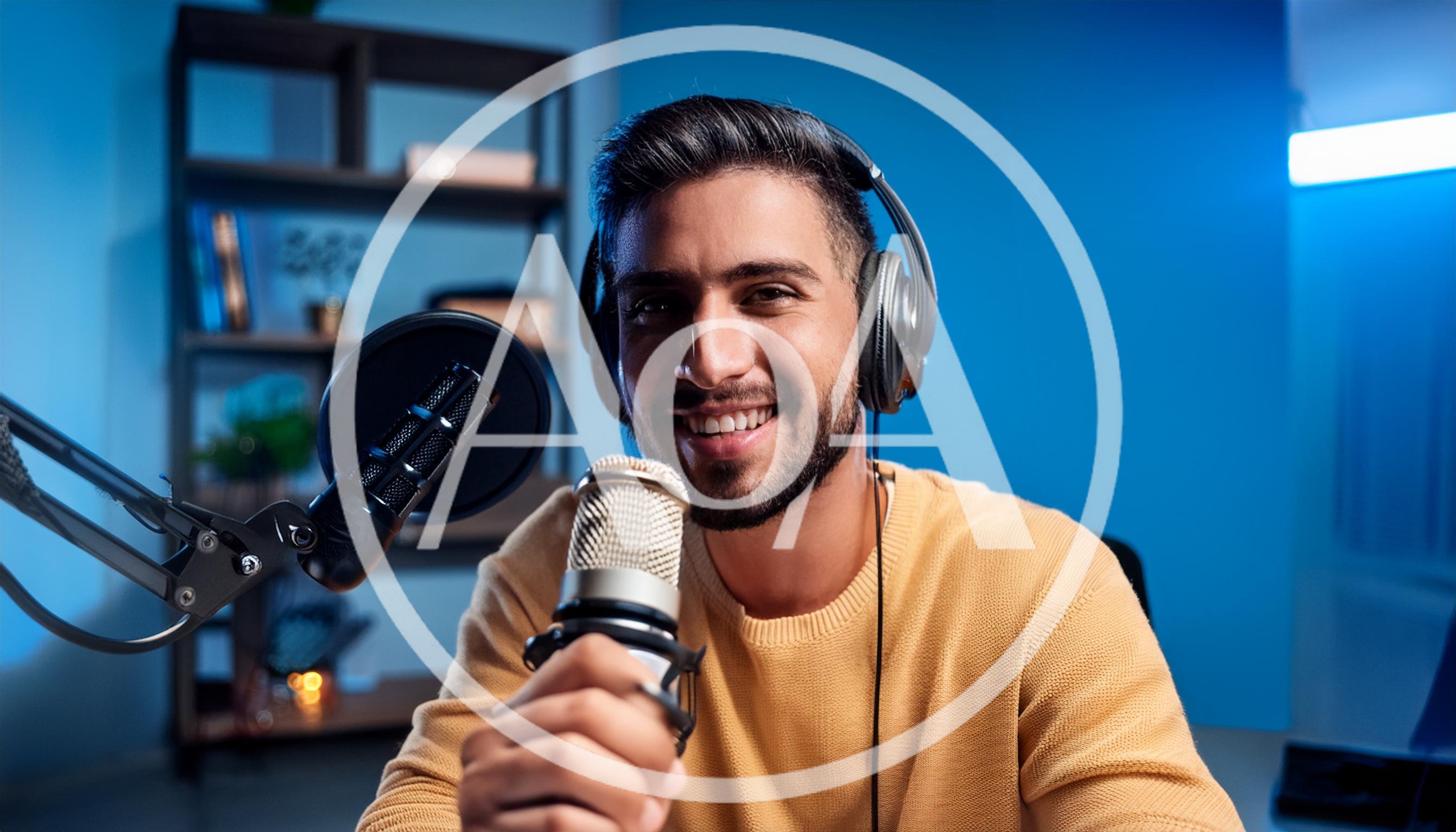 Young Man Recording Podcast In Home Studio