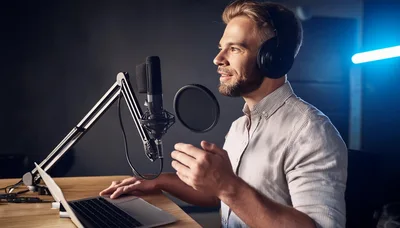 Podcaster Recording Audio Content In A Professional Studio