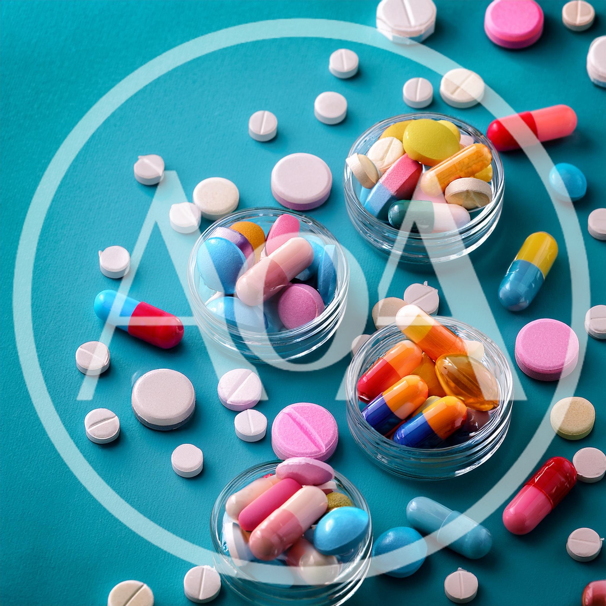 Assorted Pharmaceutical Pills and Capsules in Glass Bowls