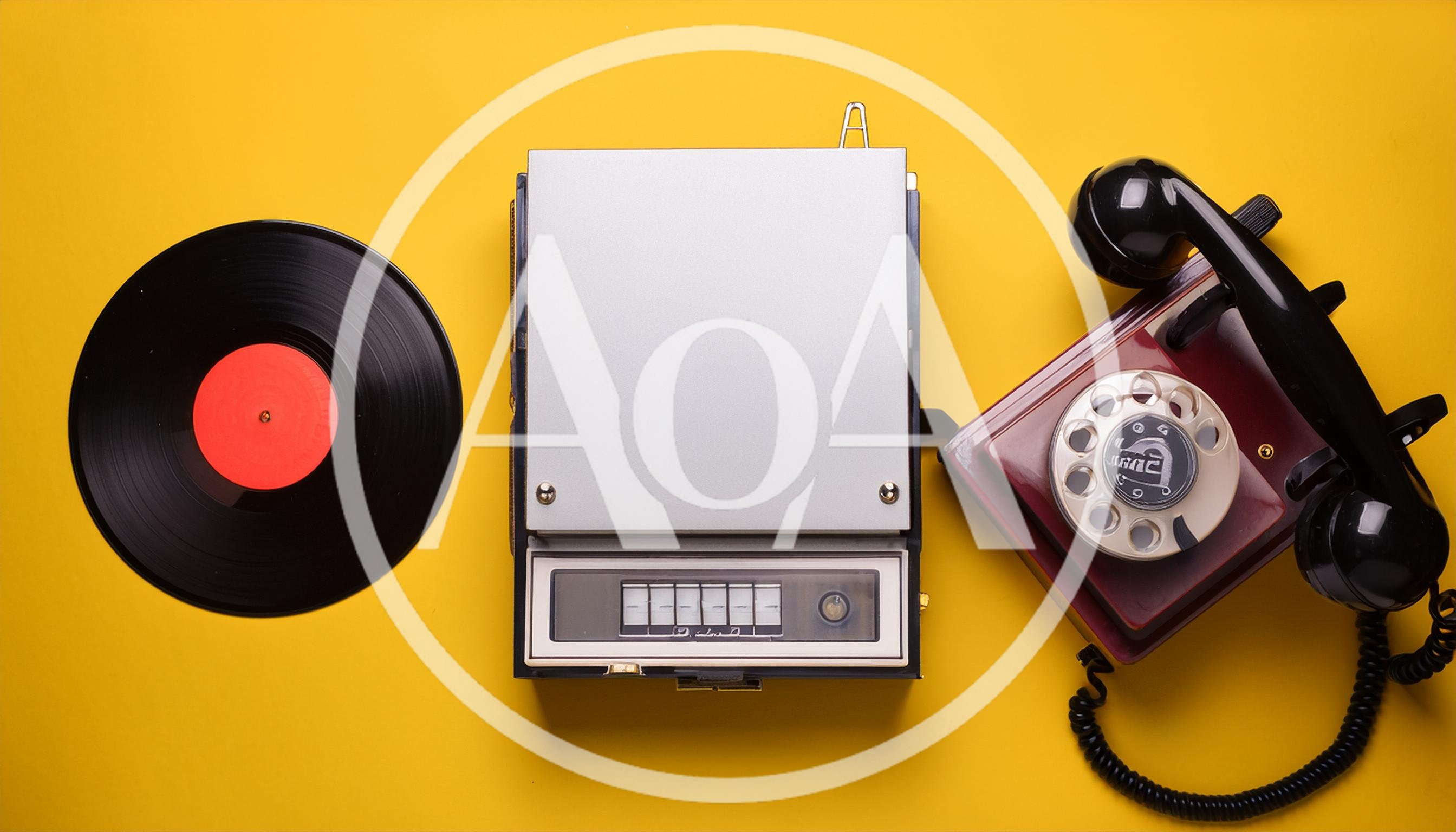 Vintage Vinyl Record Player and Rotary Telephone