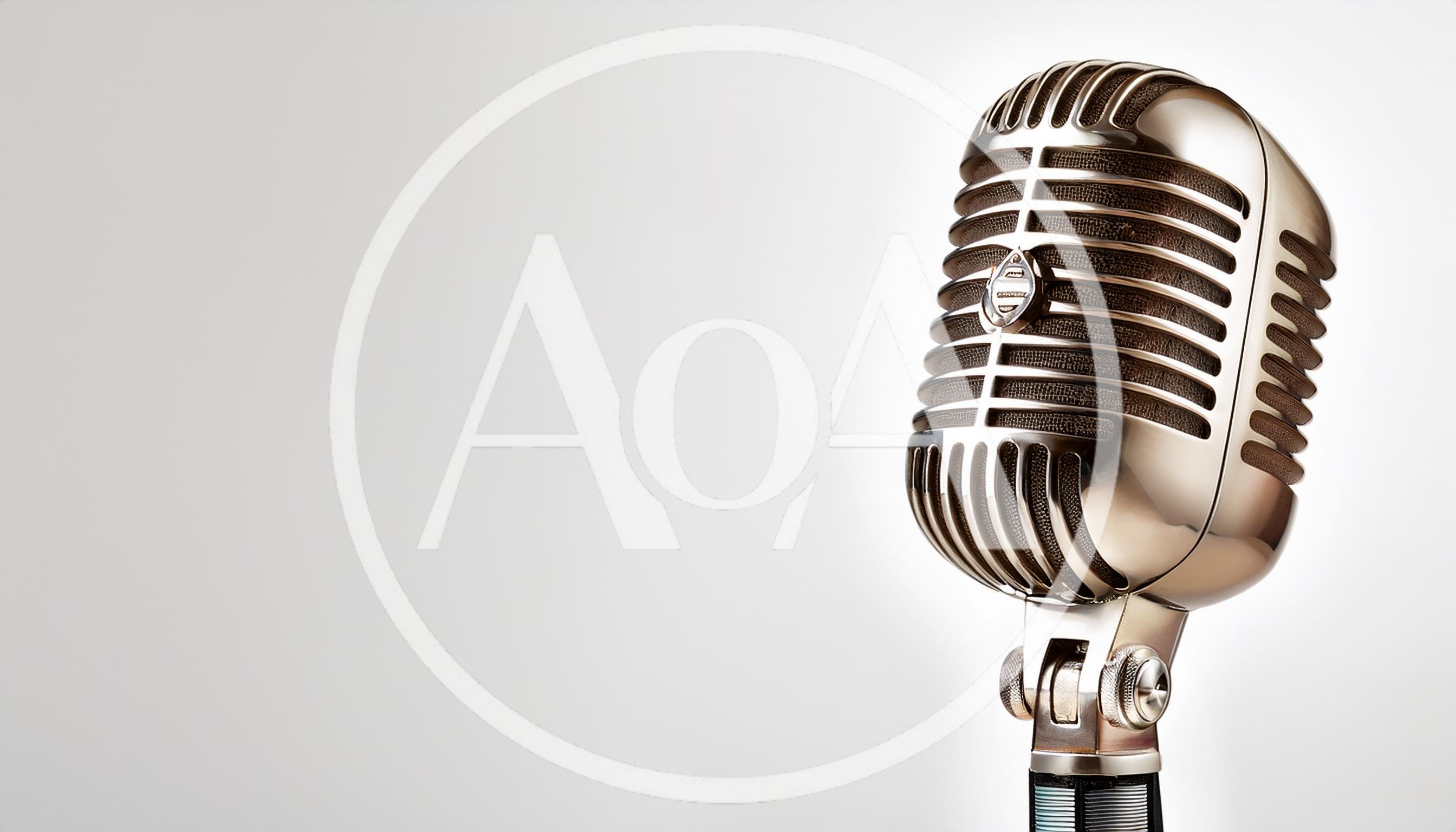 Vintage Silver Microphone On A Plain White Background
