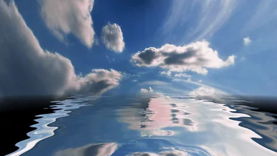 Clouds Moving Over A Calm Reflective Water Surface