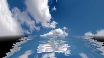 Clouds Reflecting On Rippling Water Surface