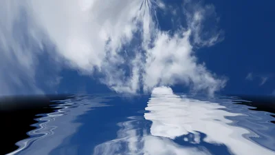 Reflective Clouds Moving Over Calm Water Surface